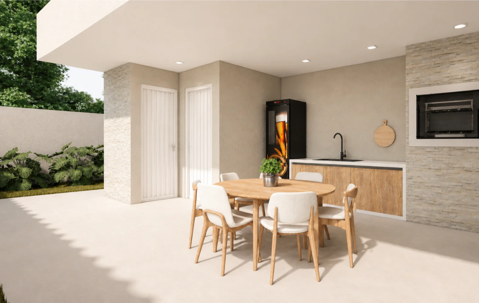 Área gourmet da Planta de Casa 3 Quartos com churrasqueira, bancada moderna e espaço para refeições integrado ao quintal.